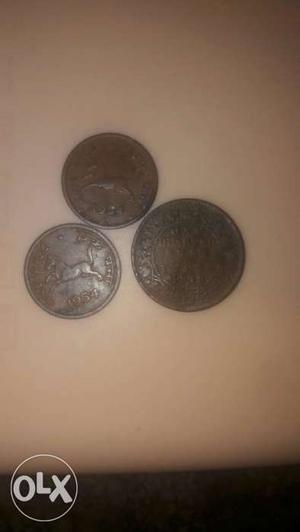 Three Round Gray Coins