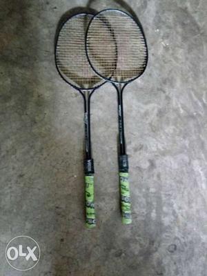 Two Black Badminton Rackets