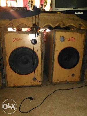 Two Brown JBL Speakers
