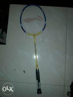 Yellow And Blue Badminton Racket Shuttle bat linen