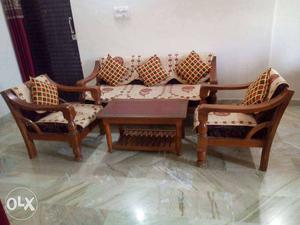 3+2 sofa with centre table made of teak wood.