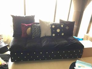 Black Leather Tufted Sofa With Throw Pillows