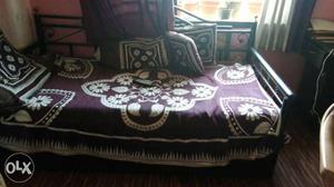 Black Metal Framed Purple And White Floral Padded Sofa plus