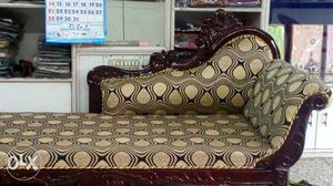 Brown Wooden Base Brown Padded Chaise Lounge