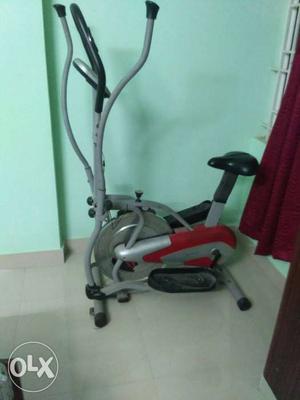 Gray And Red Cross Elliptical Trainer