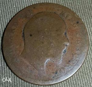 It is a one quarter anna copper coin minted in