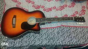 Orange And Black Cutaway Acoustic Guitar