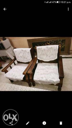 Two Brown Wooden Framed Padded Armchair