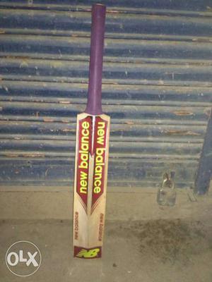 White, Red, And Purple New Balance Cricket Bat