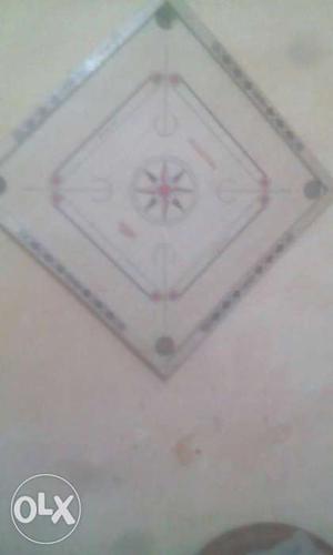 White-red-black Carrom Board