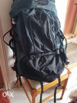 As good as new, dark green & black Wildcraft rucksack