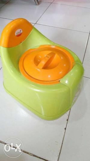 Baby potty pot with lid in good condition, unused