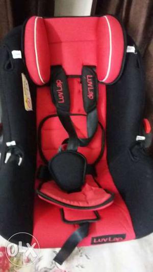 Baby's Red And Black Luvlap Booster Seat