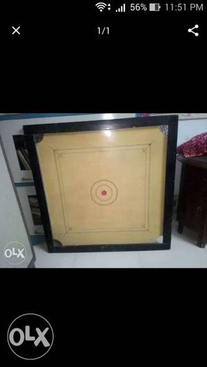 Carom Board in good condition. coins and striker