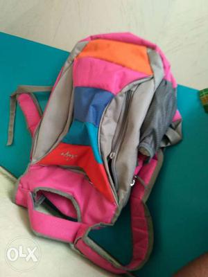 Gray, Purple, And Orange Backpack