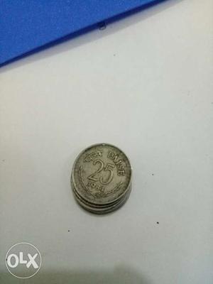 Old coins of 25 paise yr 