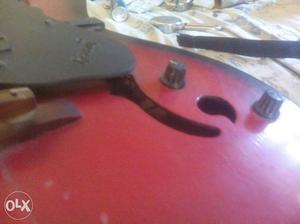 Red black guitar Semi electrical N piano. Good new