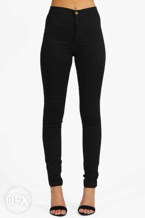 Women's black high waisted jeans.