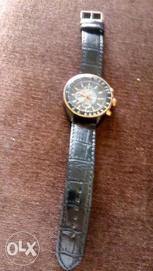 Branded Timex watch with leather belt