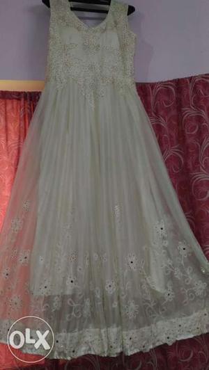 New very decent and designer white long gaun only one piece