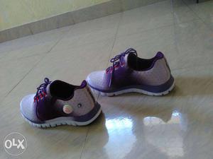 Pair Of Gray-and-purple Sneakers