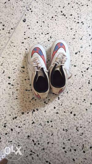 Pair Of White-red-and-blue Nike Mercurial