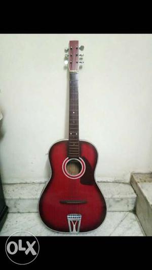 Red And Black Acoustic Guitar