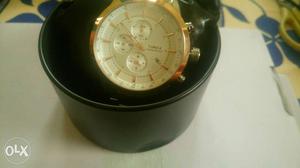 Round Gold Timex Chronograph Watch In Case