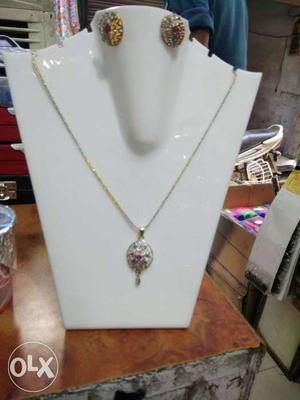 Silver And Gold Chain Necklace With Round Pendant