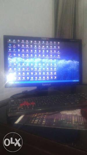 Black Computer Flatscreen Monitor; Black Computer Keyboard