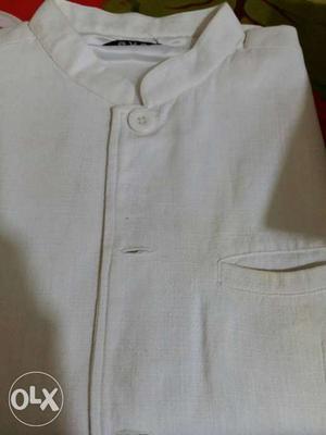 Cream waist coat with light mark near pocket 1