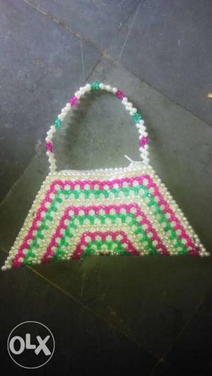 Crocheted Green, Pink, And White Handbag