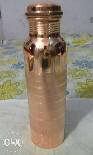 Cylindrical Gold-colored Container