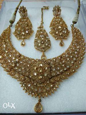 Diamond Embellished Gold Chunky Necklace And Pair Of Gold