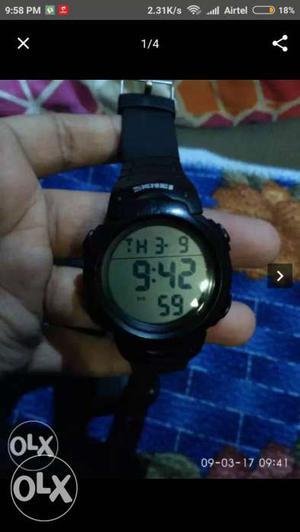 Digital watch Stopwatch Alarm It has light also