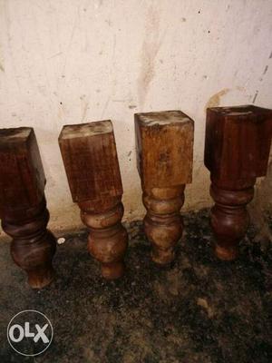 Four Brown Wooden Balusters