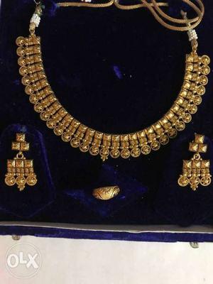 Gold Necklace, Earrings, And Ring Set