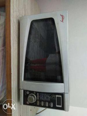 Gray And Black Digital Microwave Oven