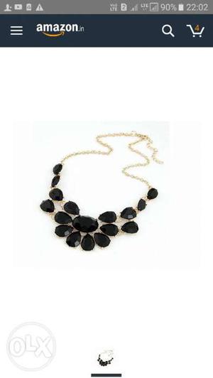 It is a beautiful new black gem necklace unused i bought it