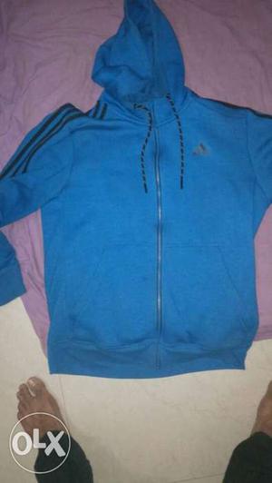 It is a pure new Adidas hoody of size XL.I