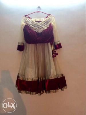 Maroon choli with net lehanga in very good