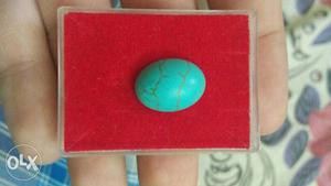Oval Shaped Teal Pendant In Box