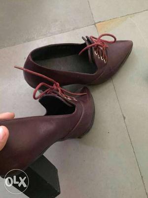 Pair Of Maroon-and-black Shoes
