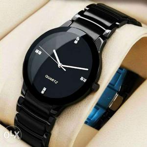 Quartz black watche is for sale