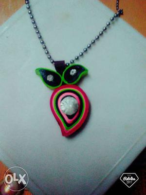 Quilling locket with a big american diamond