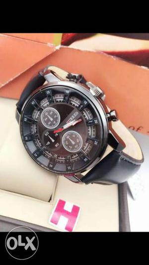Round Black Chronograph Watch With Leather Strap