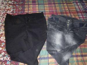 Two Pairs Of Black Jeans