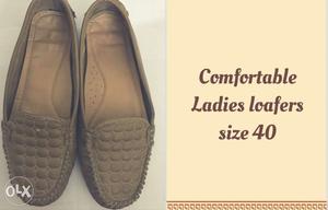 Women's Pair Of Brown Loafers