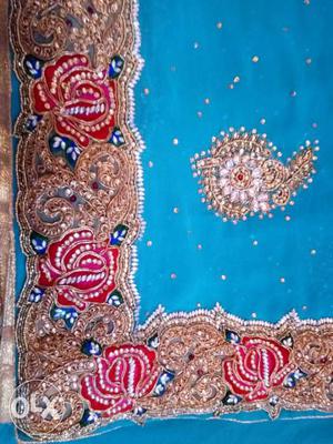 Blue, Brown, And Red Textile