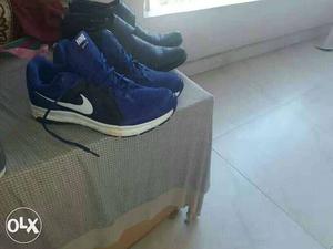 Blue Nike Low Top Sneakers and black leather shoes HITZ..9